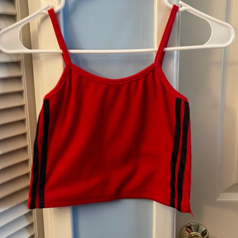 Red cropped tank top with black strips up the side